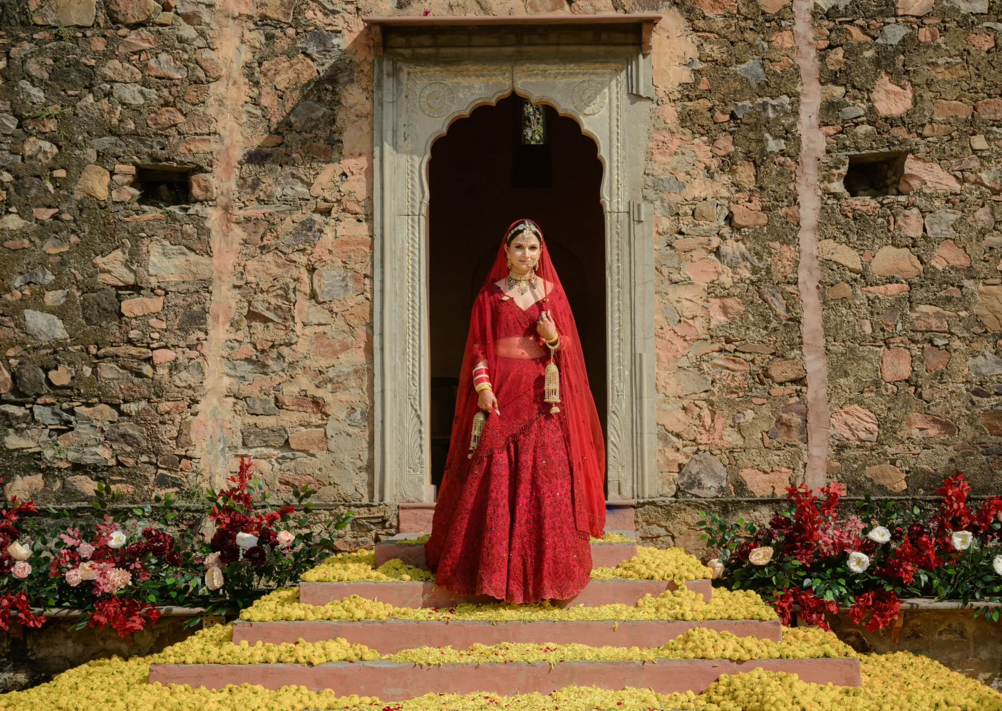 Warm bridal tones — coral, marigold and red — Indian wedding colour story