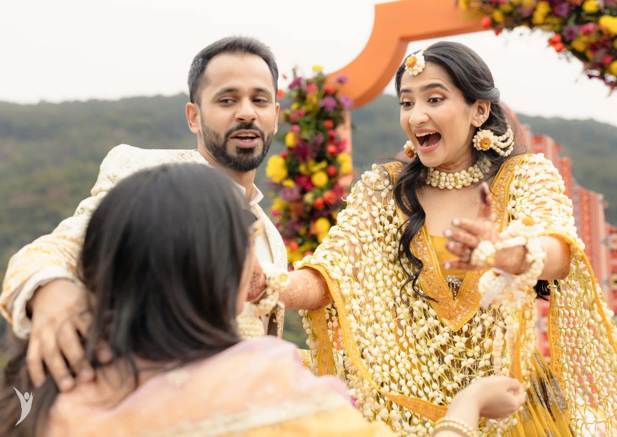 Documentary wedding photography — an unposed candid moment at a haldi