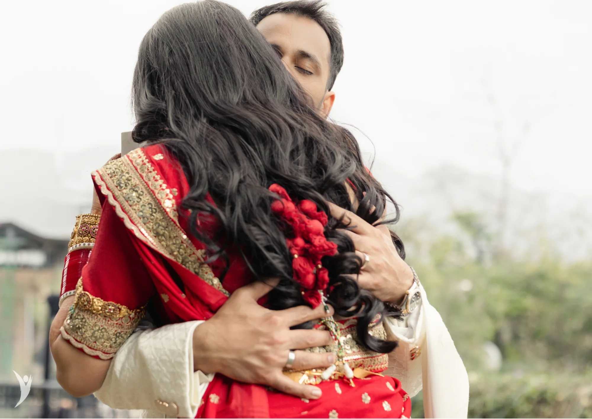 An unposed embrace at an Indian wedding — documentary wedding photography